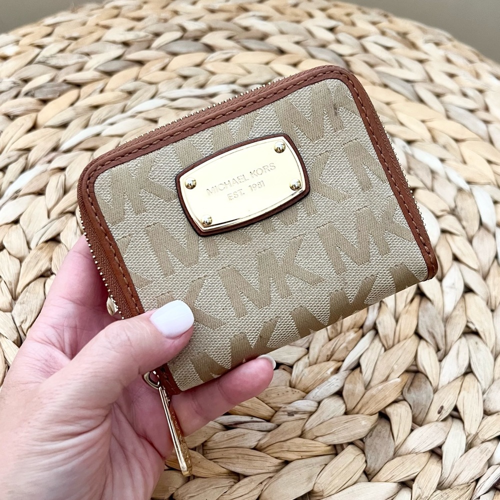 Michael Kors canvas monogram with genuine leather trim zip-around card wallet